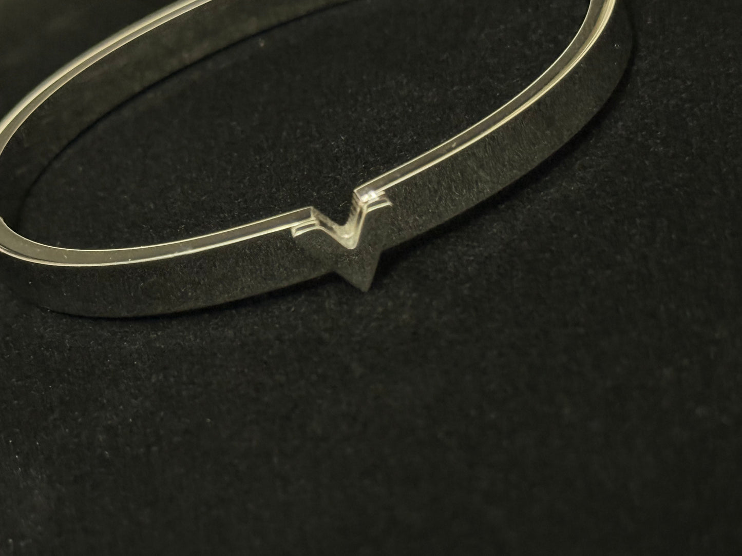 V Silver Bangle